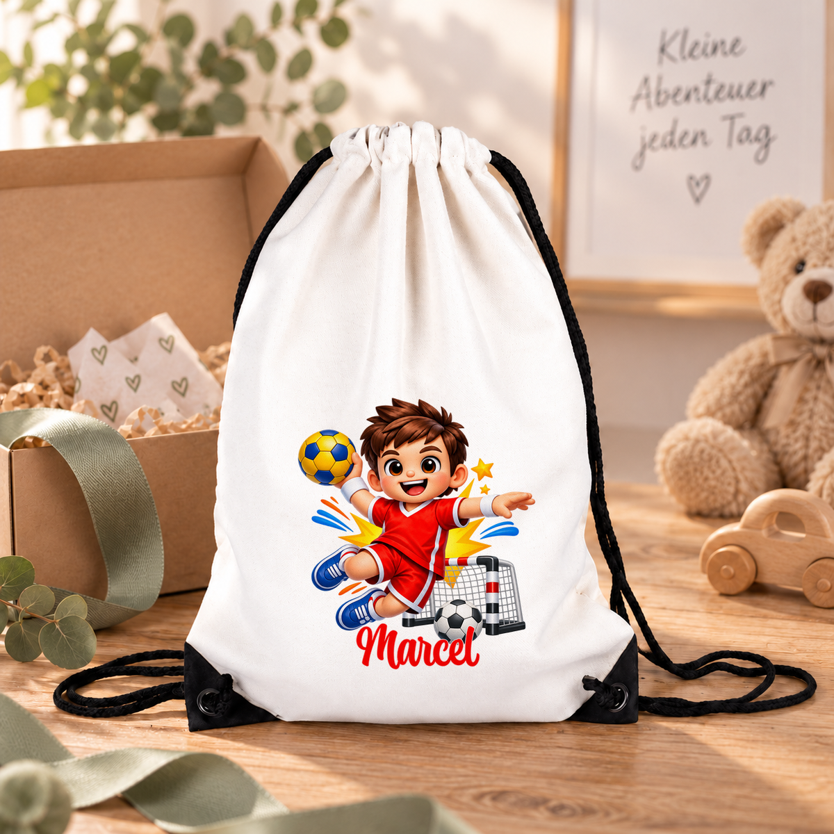 MUCKKI-PRO:e7f223cd9d452e0d7bf6f934d71008dd4e98964a781752d493488e412b59c63a:Turnbeutel Handball 1 mit Wunschname personalisiert