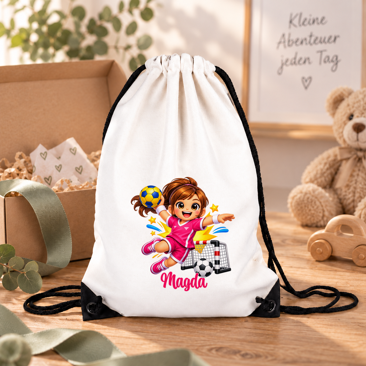 MUCKKI-PRO:a6b33ed44eb82fa042a03d5af7733cc4829b114d80d9a45f974bee02a7822a5f:Turnbeutel Handball 2 mit Wunschname personalisiert
