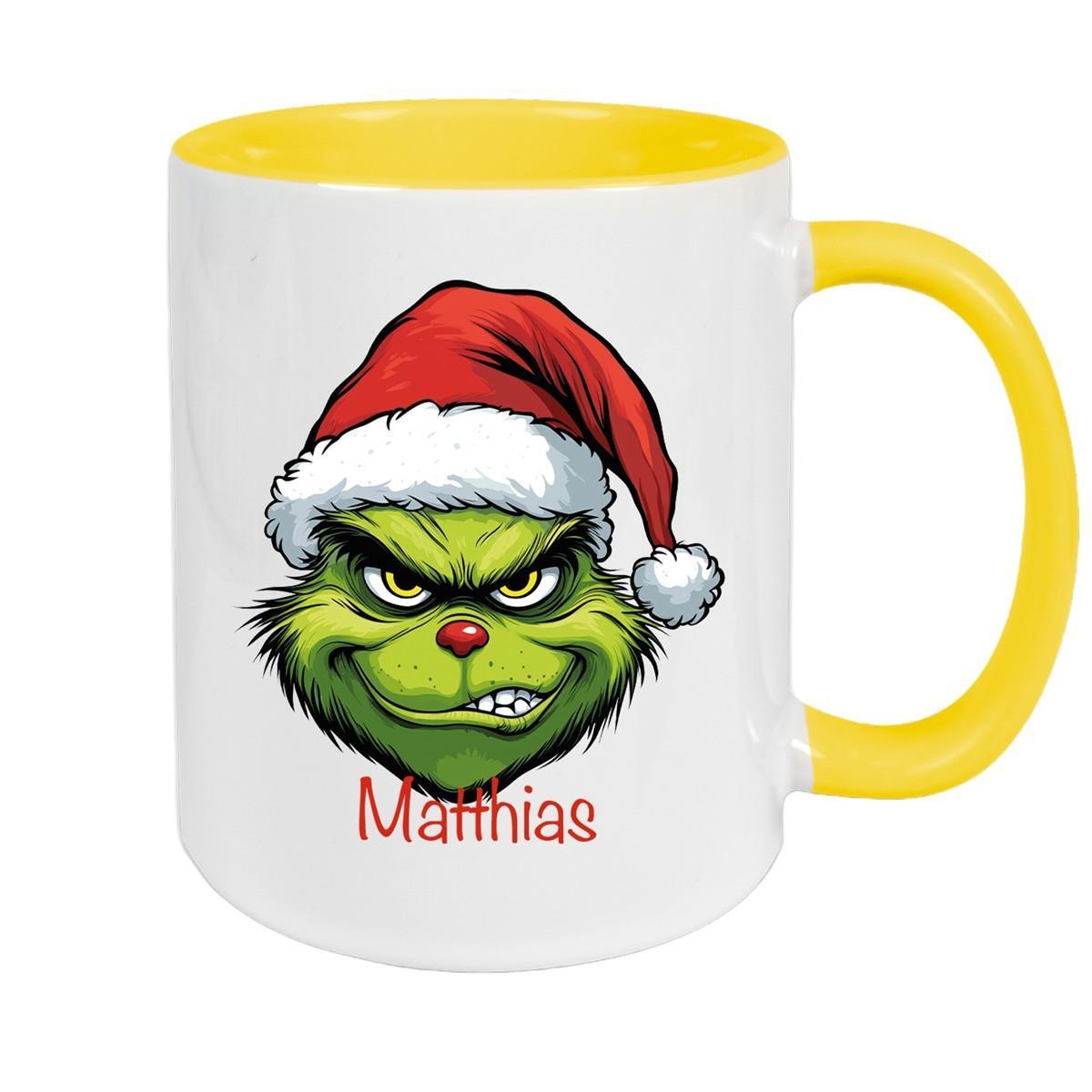 MUCKKI-PRO:059df53c6c15505bd09506e66bf11914849577af3a17f29a851bb78f125374ca:Tasse Wunschname Weihnachten Grinch 9 Keramik Kinderbecher – Gelb