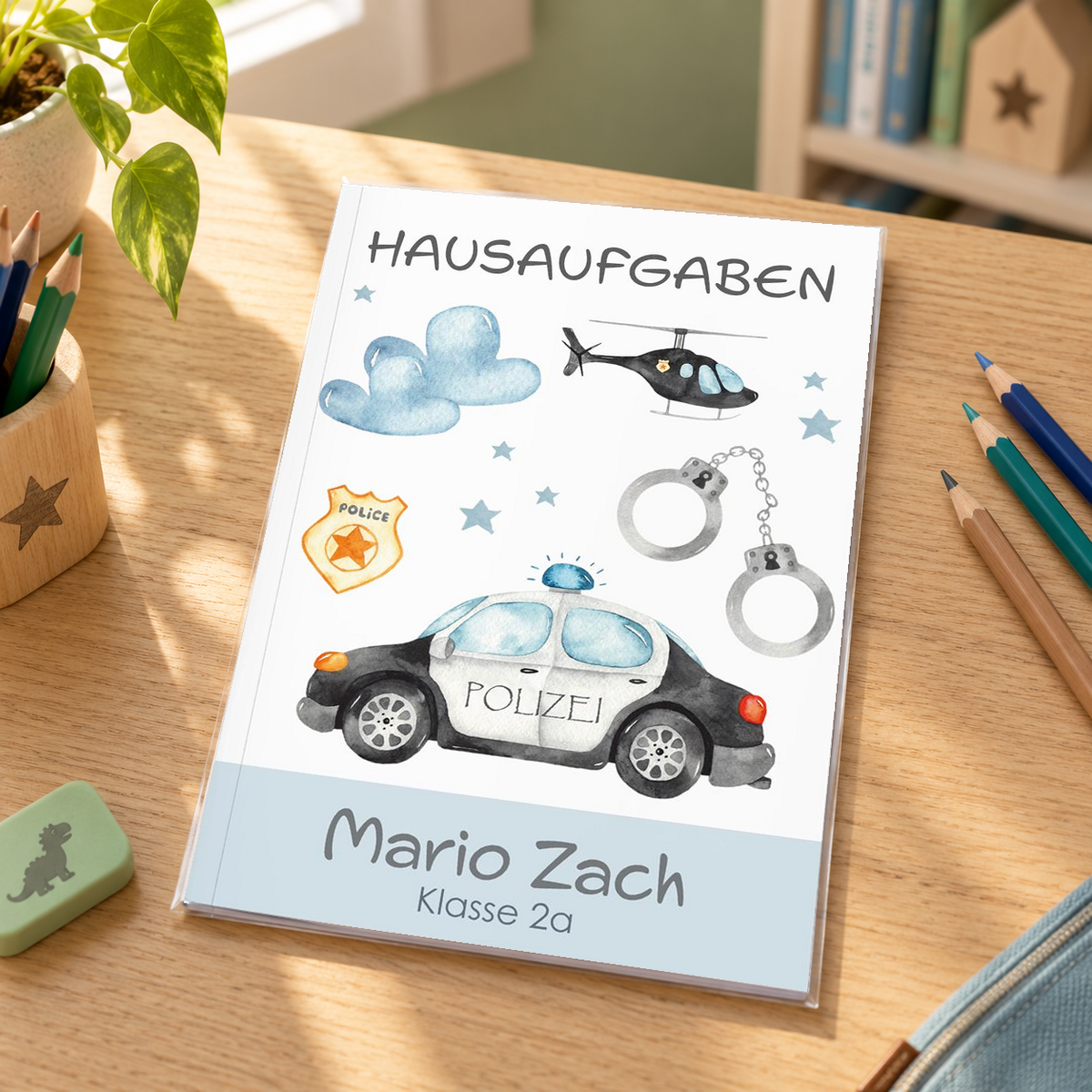 MUCKKI-PRO:61adba56fb69612cb633dcf12d61b4ffccaea940540d8084b2b39109029f3d97:Hausaufgabenheft Polizei 1 DIN A5 - 48 Blatt mit Name und Klasse